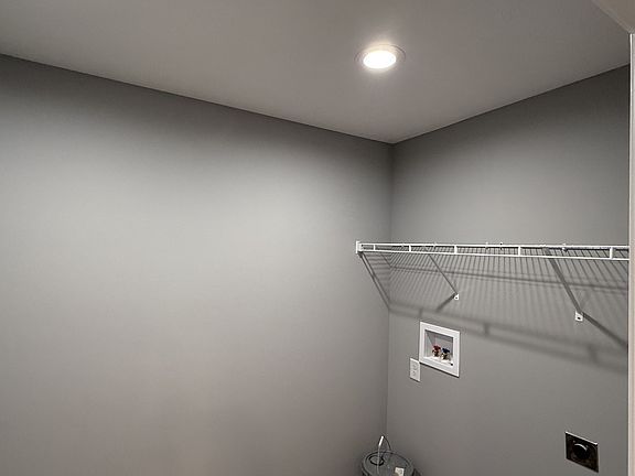 Laundry room, plenty space for extra storage, washer and dryer not provided but connections available