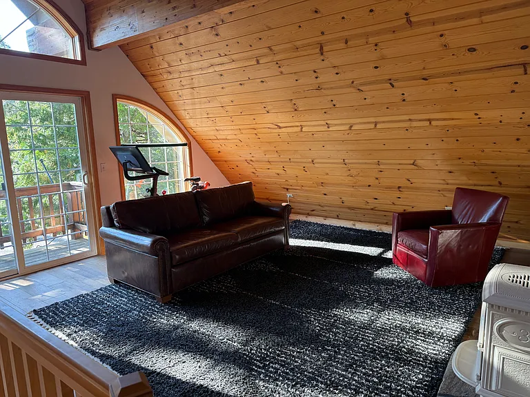 Mezzanine with deck, TV and peloton