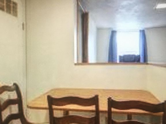 eat in kitchen/large window in living room