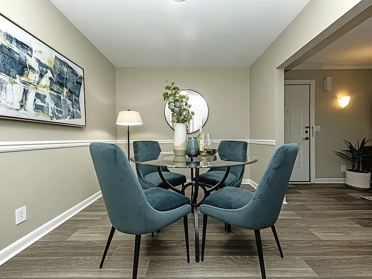 Dining area with built in lighting and wood inspired flooring