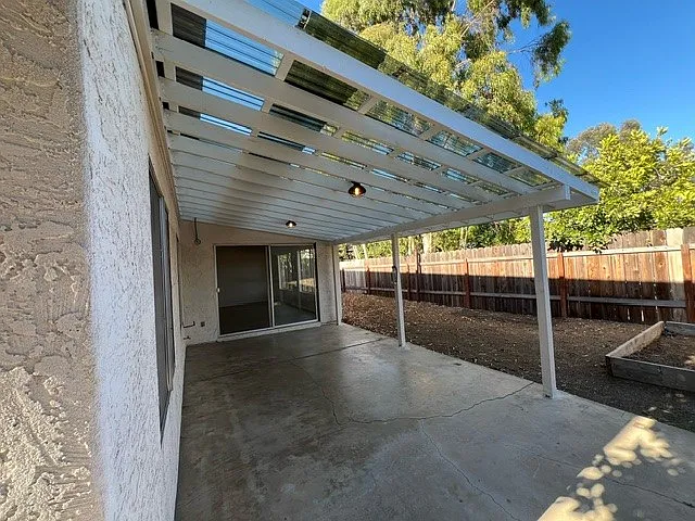 Backyard patio and yard area