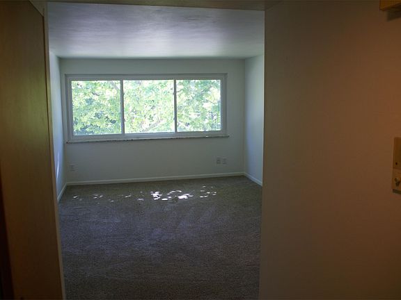 Comfortable living room with a view of Glen Oak Park