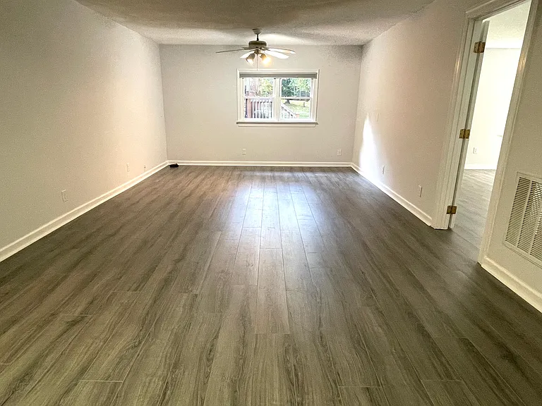 Just off the kitchen is a large dining area with space for a den/study.