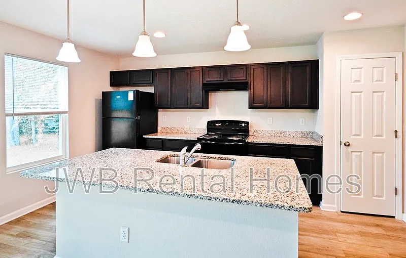 Building Photo - 9027 Dandy Ave