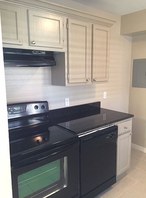 Kitchen with new black appliances