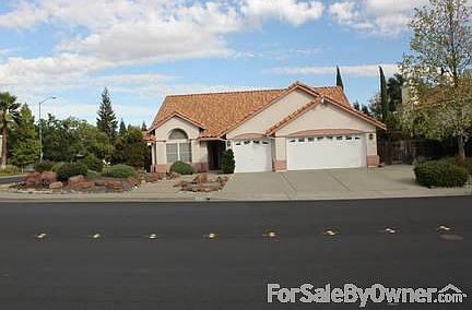 457 Wrentham Drive
						:
						Front of Home, large corner lot with low maintenance landscaping.