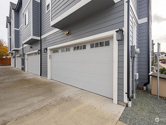 Property boasts spacious two-car garage.>
