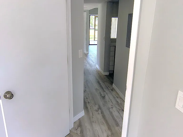 Guest room #2 leading to kitchen and living room