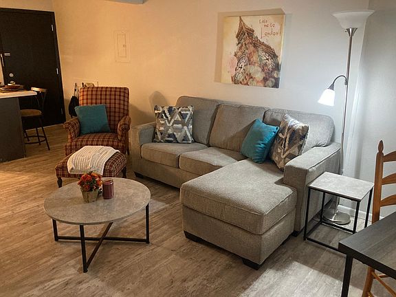 Beautiful room with new hardwoods, paint. Brand new flat screen tv comes with unit as does furniture purchased 9/22