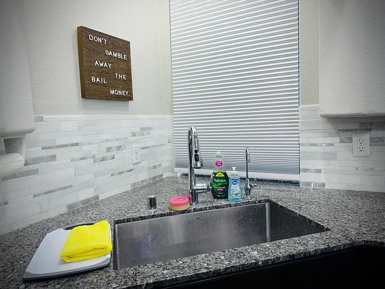 XL kitchen sink with extendable faucet are a must.