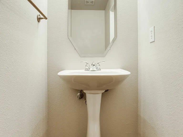 3127 Waits, Unit 103. Downstairs powder bathroom.