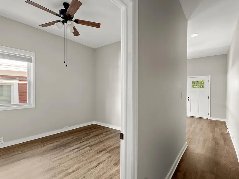 View of bedroom and livingroom from hallway