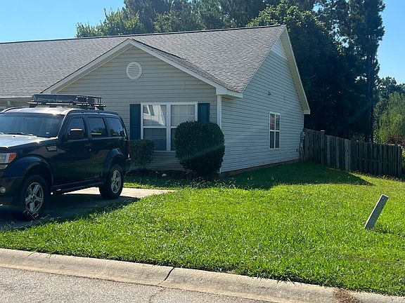 Side View with Fenced in back yard