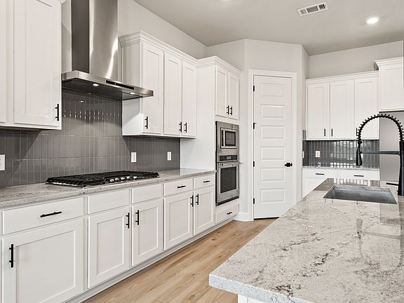 Stainless steel appliances are included