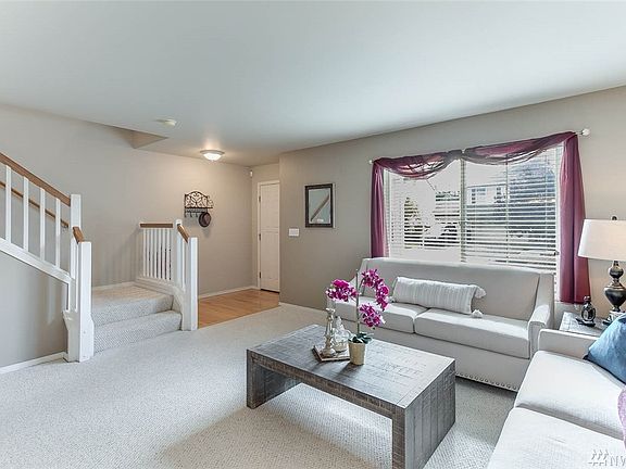 Extend your entertaining outside to the fully fenced back yard that has both a patio and deck. The back fence is lined with raised planting beds that are just begging for a spring vegetable garden. Relax in the spacious master suite with ensuite bath and a walk-in closet big enough for even the most enthusiastic shopper. Three more guest rooms, a full bath with double sinks and a expansive bonus area round out the second floor. All of this combined with easy access to the Eastside, freeways, shopping, restaurants and entertainment make this home a definite must see!