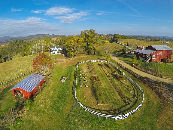 Aerial of riding ring & barn