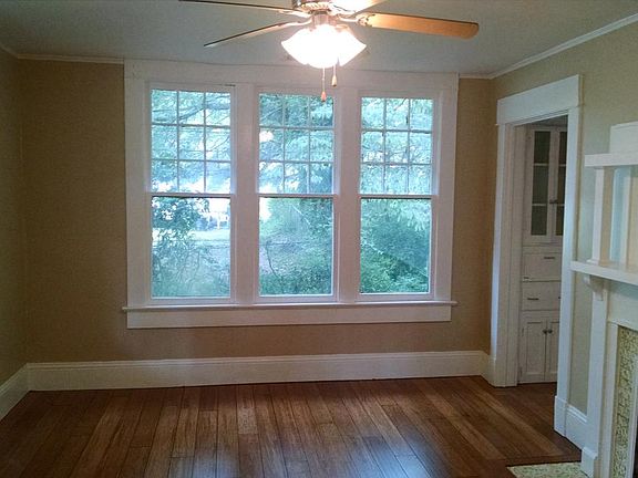 Living Room w/Lots of Natural Light and Decorative Fireplace
