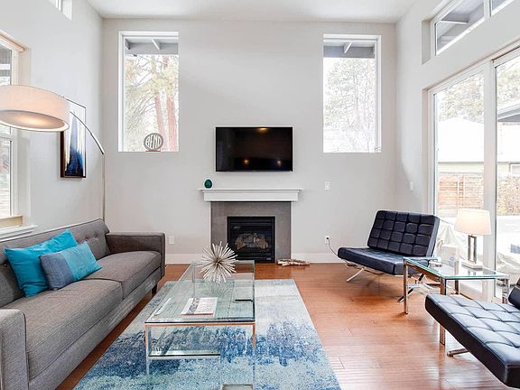 Beautiful natural light comes in through the windows amplifying the open floor plan. Natural Gas Fireplace
