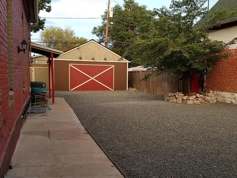 Side yard. Picnic table and outdoor furniture (not pictured)