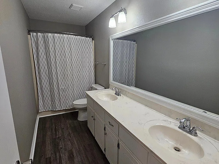 Spare bathroom with fuel vanities