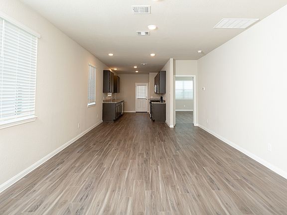 Family Room to Kitchen and Dining Area
