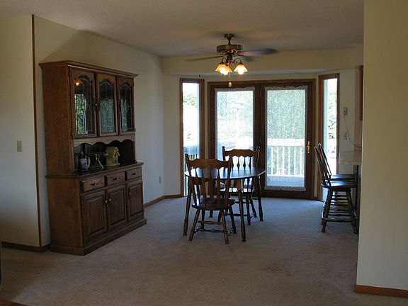 DINING ROOM W/NEW ATRIUM DOOR TO DECK, FRESH PAINT
