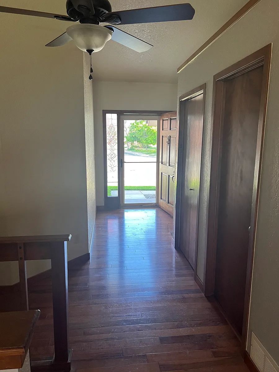 Front door view from living room. - 3246 S Kendall St