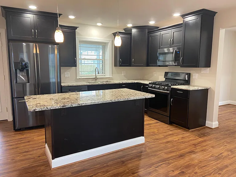 Mocha Kitchen with granite countertops and all new appliances