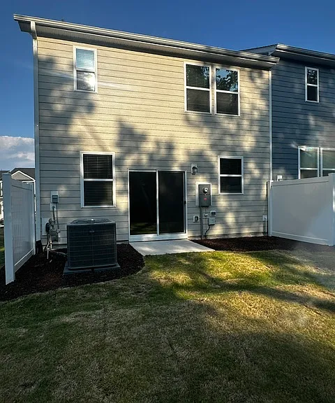 Backyard, facing the back of townhome.