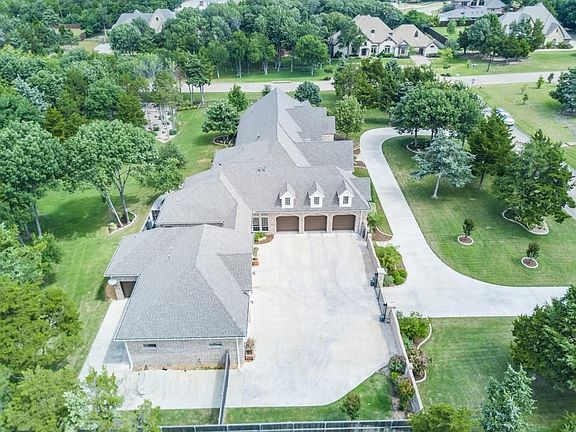 Highly coveted corner lot provides additional privacy and surrounding land.