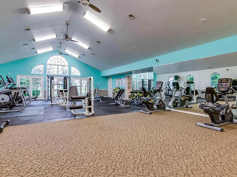 The 24-hour fitness center includes cardio and strength-building equipment.