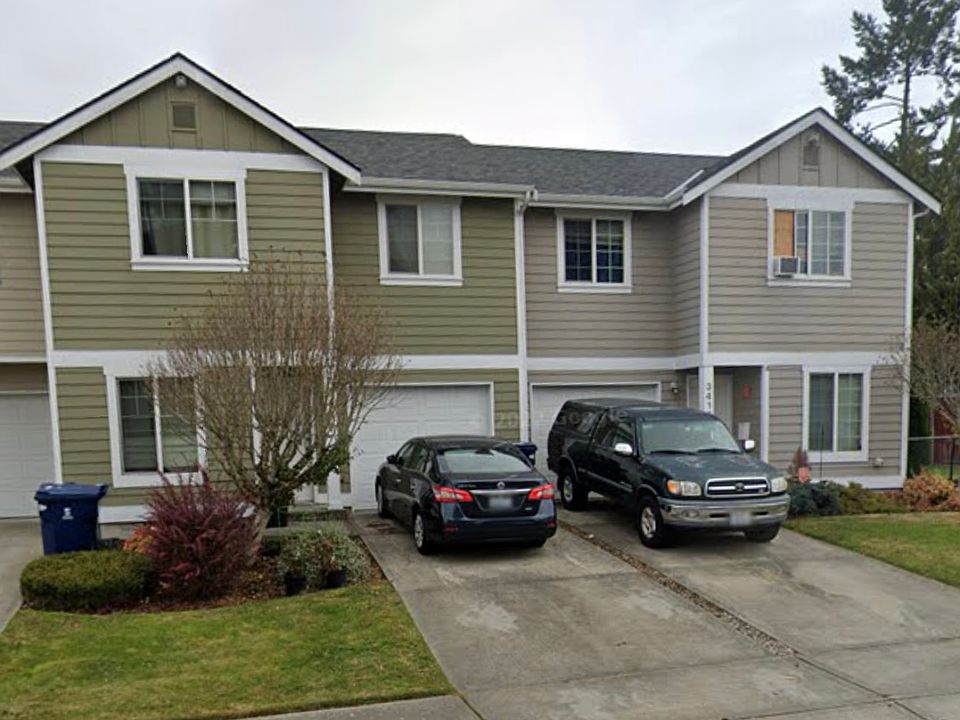 The unit on the left side with a long driveway.