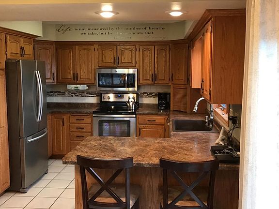 Kitchen toward stove N4658 Timbercrest D
