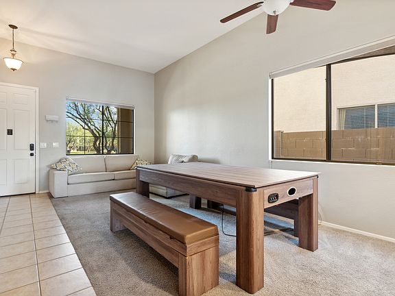 Game table. Extra seating or top can be removed for ping pong and air hockey.