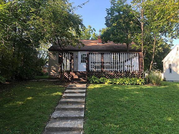 Back of house, deck, and yard.