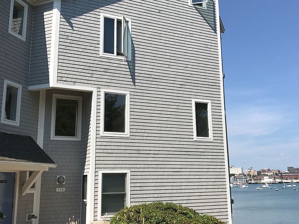 2 bedroom end unit condo perched on the beach.