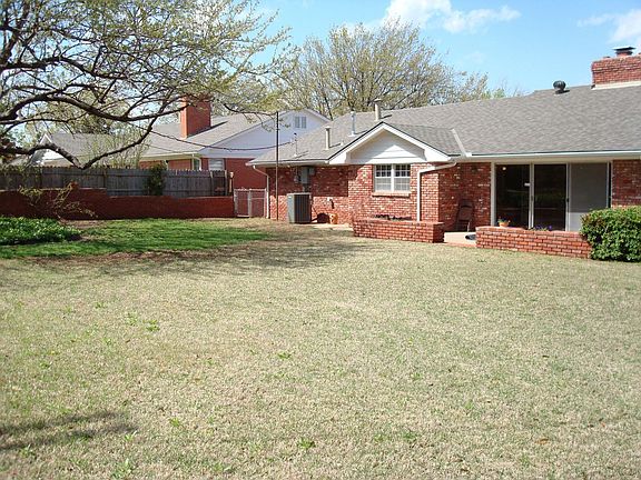 Enjoy the park-like backyard year round