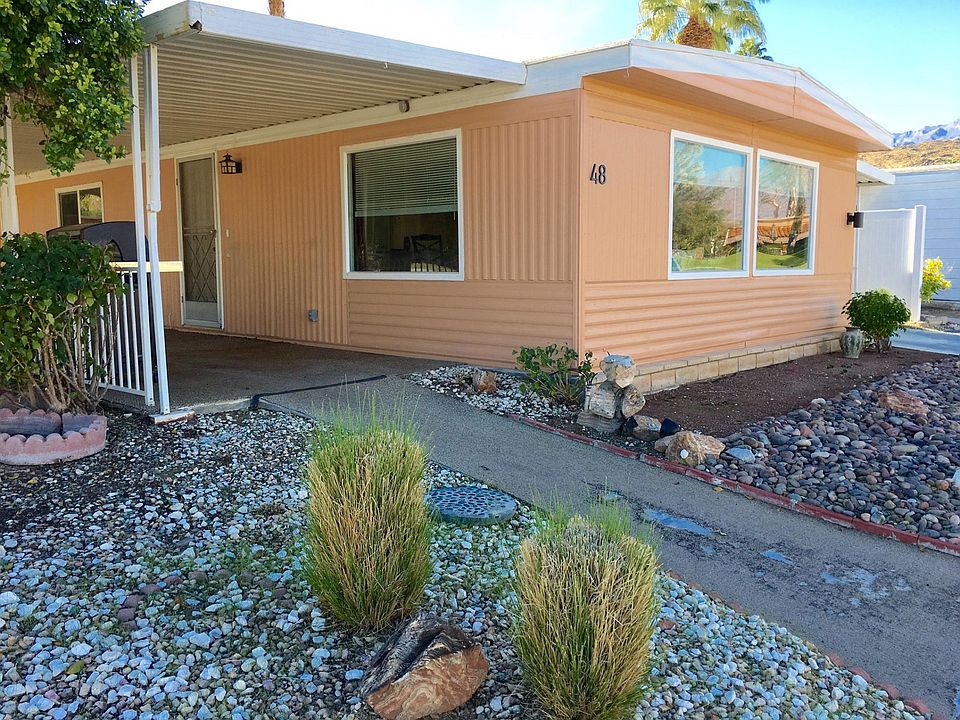 48 Front Shot Rocks with House