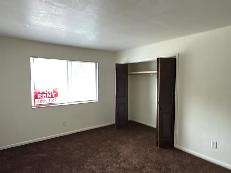 Bedroom # 2 with lovely new carpet and large closet and great views!