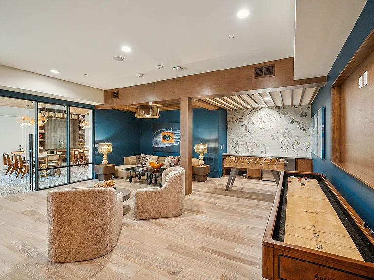 Gather with neighbors in your stylish community lounge