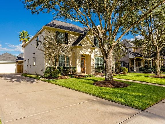 This beautiful home features a spacious detached garage with workbench, and privacy gate to back yard with a stunning pool.  The long drive way is great for extra vehicles or guest parking.