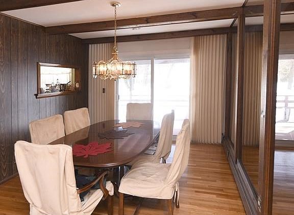 Access the covered deck through the formal dining room.