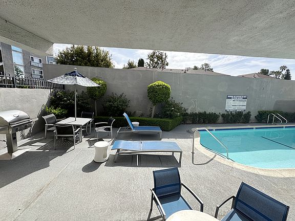 POOL Area w/ BBQ's