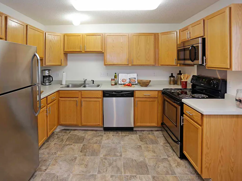 Stainless steel appliances in select apartments