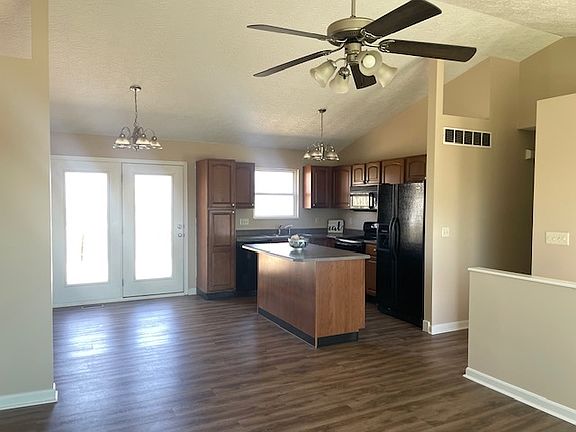 New LVT throughout home. Open concept living room, eating and kitchen.