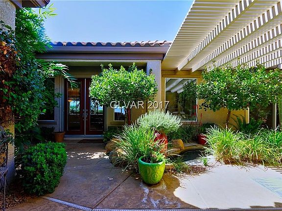 The interior courtyard has an extended cover for additional shade as you sit outside to enjoy the wa