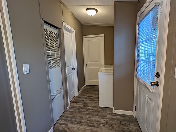 Rear Door Laundry appliances included Bath and Master Bedroom