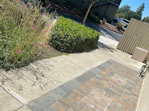 patio and parking spot (black car)