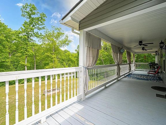 Huge back porch that overlooks the lake in your back yard