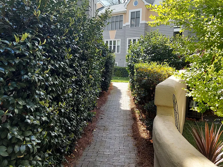 Lush grounds surround you at Queens Station!
